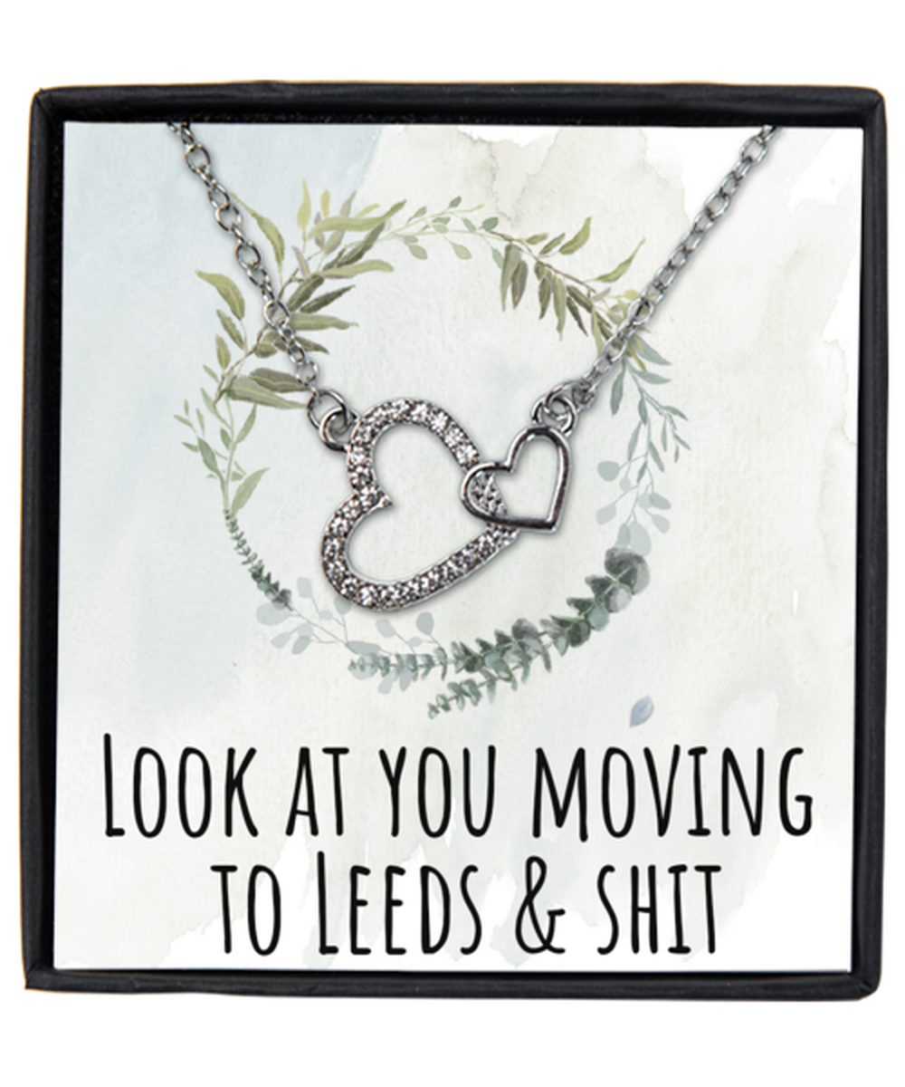 Moving to Leeds United Kingdom UK England Moving Away Necklace Interlocking Heart Silver Pendant Jewelry Merch